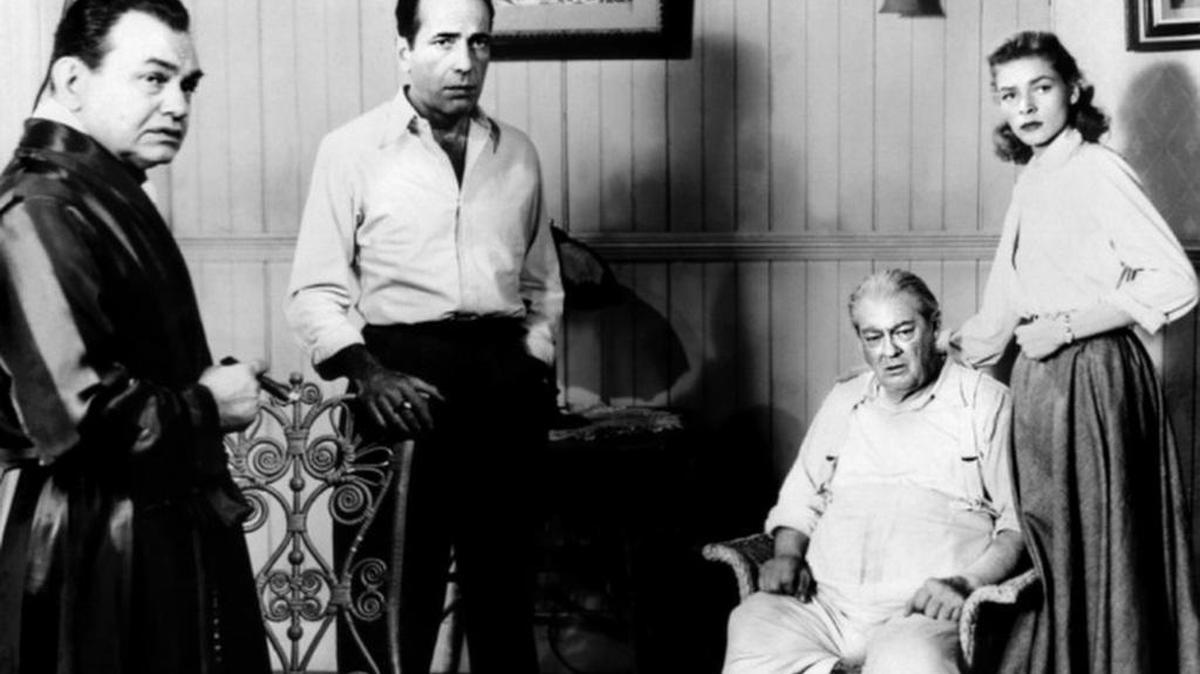 Edward G. Robinson, Humphrey Bogart, Lionel Barrymore and Lauren Bacall star in ‘Key Largo,’ a 1948 film about gangsters holed up in Key Largo during a hurricane.