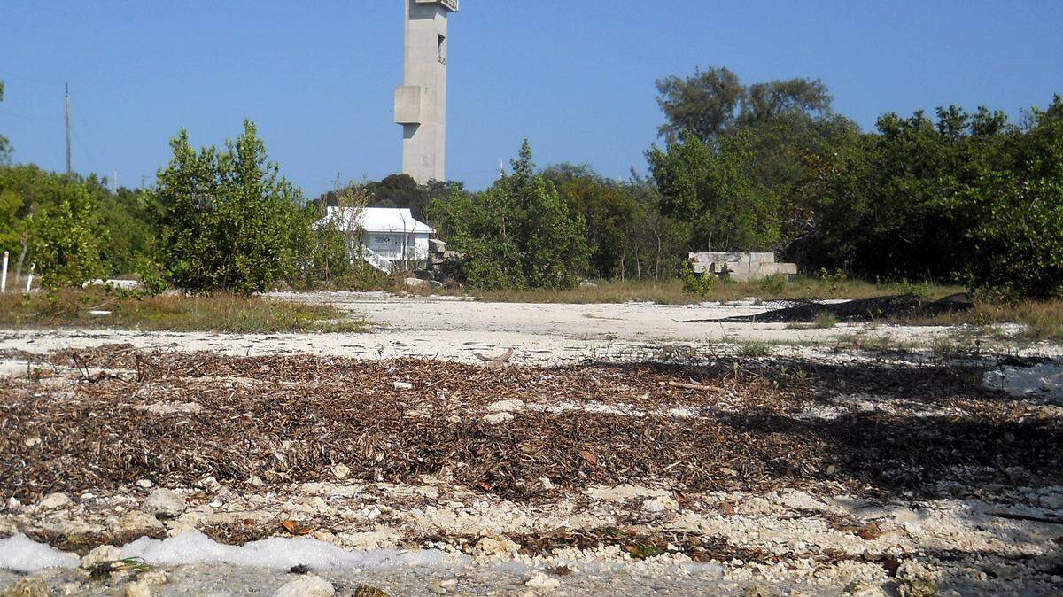 A three-acre waterfront site on Key Largo, previously used as a site for marine-mammal rescues, remains largely vacant as the result of a lengthy court dispute over mortgages and code fines.