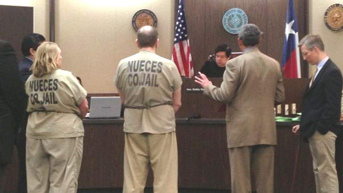 Jim Ovecka and Michelle Chapman appear, shackled, at a court hearing in Corpus-Christ, Texas, where the pair admitted defrauding numerous customers at a restaurant they owned. Ovecka shot and killed Chapman, then himself, on Big Pine Key Monday, the Sheriff's Office says.