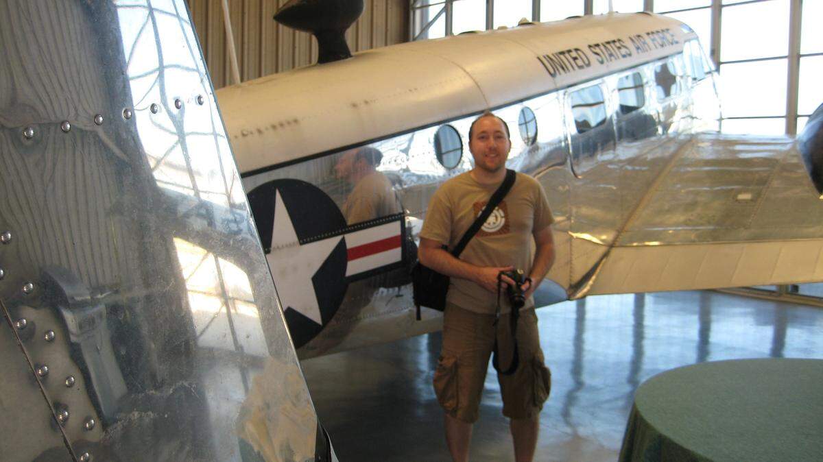 Visitor from California tours EEA Air Museum in Marathon. This World War II-era Beechcraft was used to ferry officers during the war.
