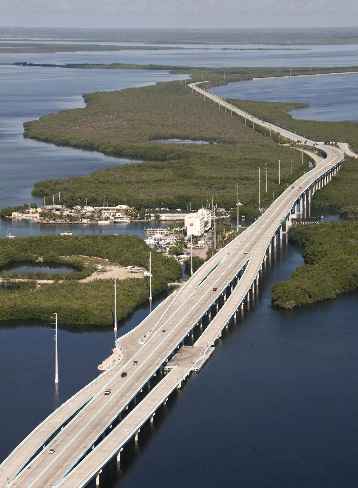 An aerial photograph shows the southern end of the 18 Mile Stretch of U.S. 1 leading in and out of the Florida Keys.
