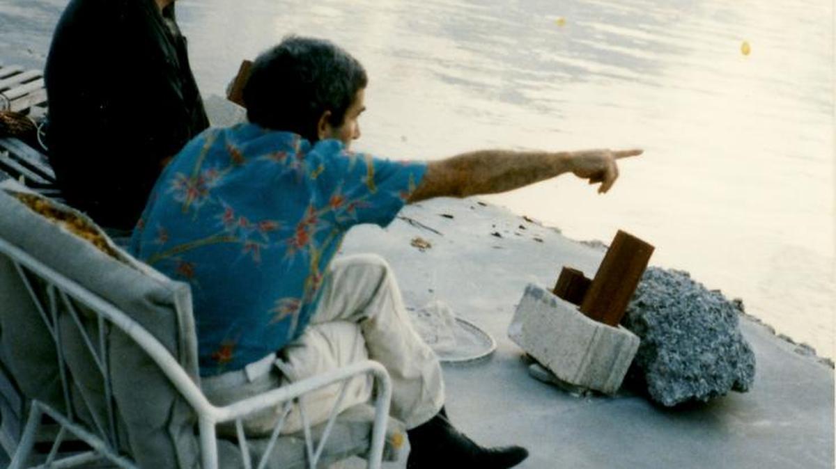 Jules Olitski and Larry Poons, two internationally renowned abstract artists, sit together on a dock in Islamorada.