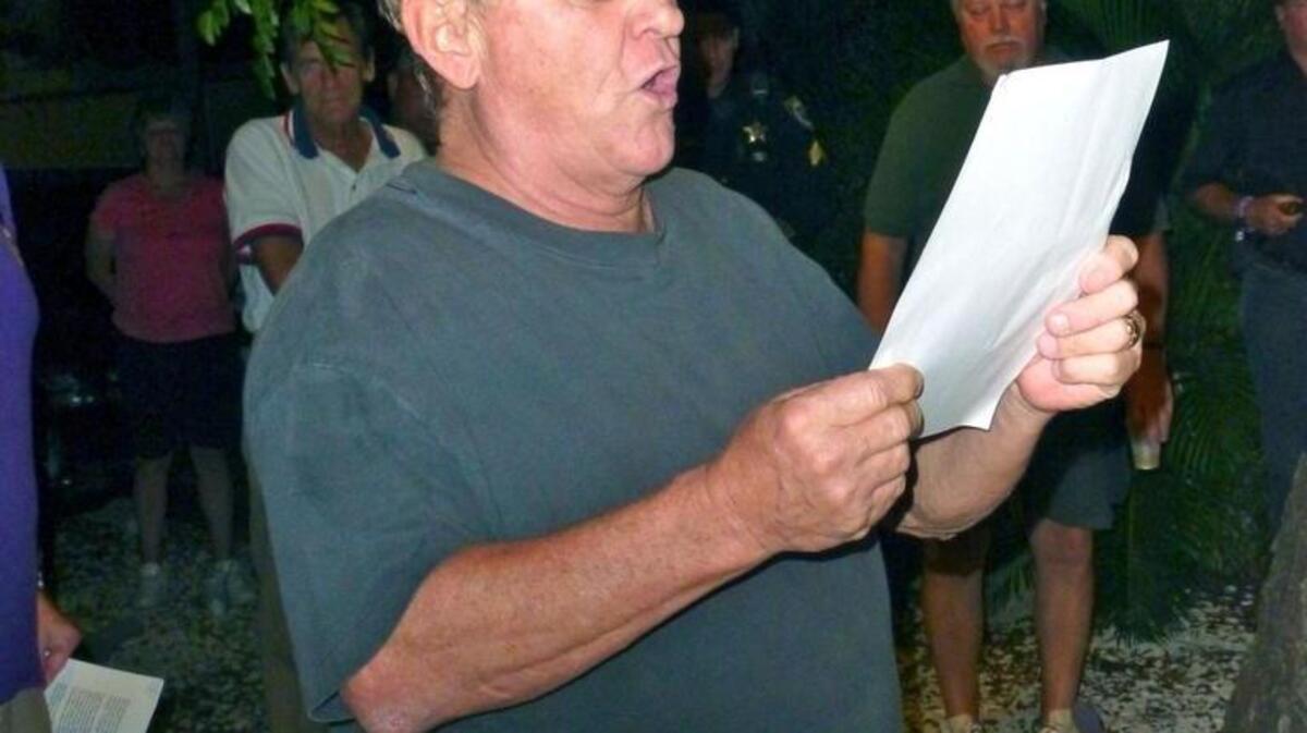 Norman Higgins reads a message from the Marine Corps commandant during the celebration of the Corps’ birthday at the Key Largo American Legion.