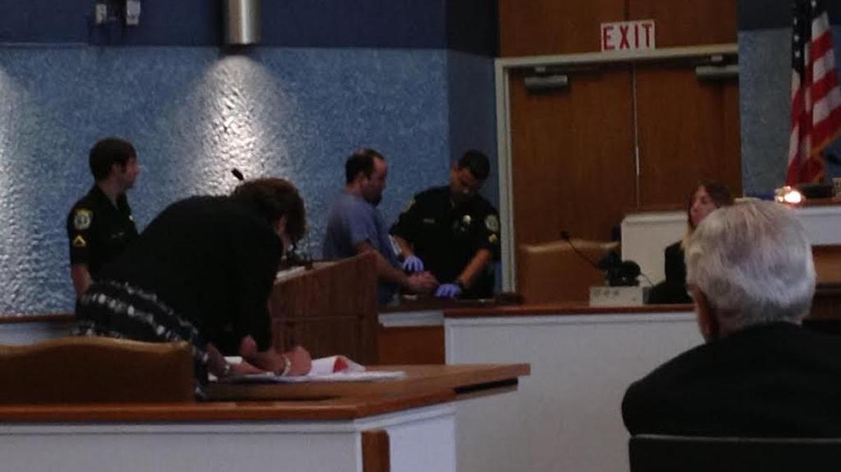 A Monroe County Sheriff’s Office deputy takes Adrian Demblans’ fingerprints at the Plantation Key courthouse on Monday, April 10. Demblans pleaded guilty to accessory after the fact of a capital felony relating to the 2015 double homicides of Tara Rosado and Carlos Ortiz inside their Tavernier home. As part of the plea deal, Demblans agreed to testify against the accused shooter, Jeremy Macauley.