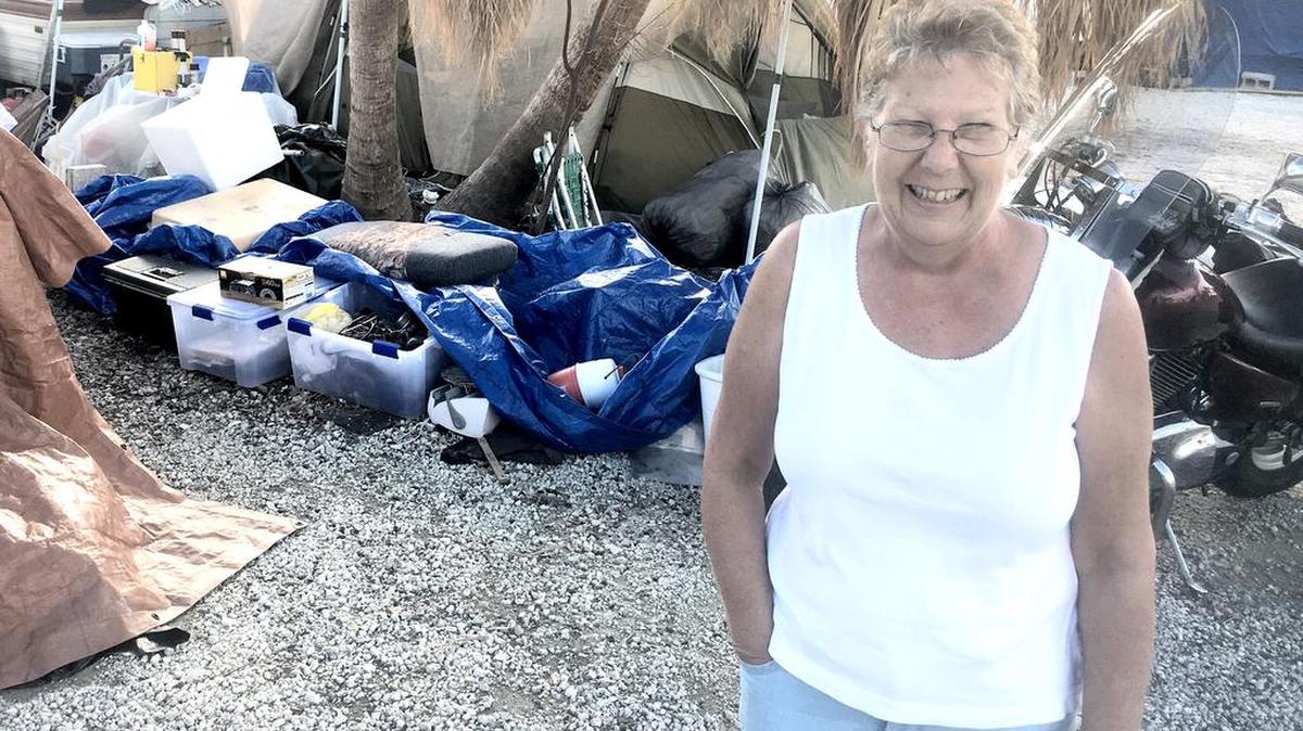 Lori Jones smiles even though she’s been living in a tent for the last few months after Hurricane Irma destroyed her trailer on Big Pine Key.