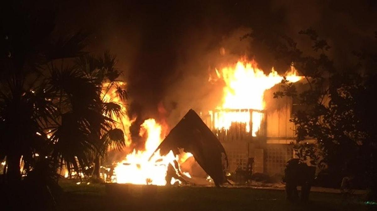This house at 219 W. Sandy Circle on Big Pine Key burns Friday morning, a day after another house was destroyed by fire in Bay Point, also in the Lower Keys.