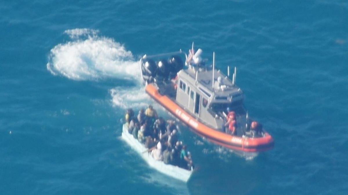 A Coast Guard Station Key West boat crew approaches a Cuban migrant boat on Nov. 10. The vessel had 18 people on board. It was stopped about one mile southeast of Marquesas, Florida.