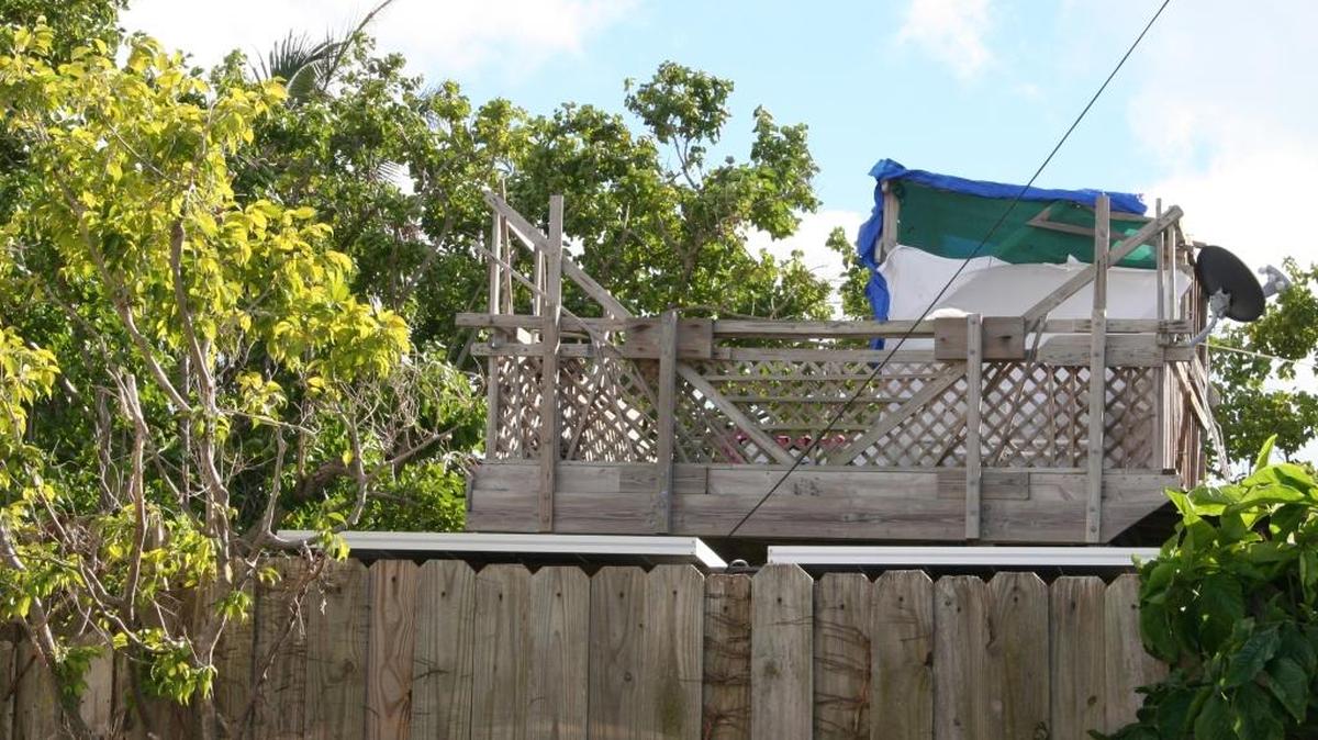 This is the tree house on Laurel Avenue on Stock Island where police say three people were living when the murder took place.