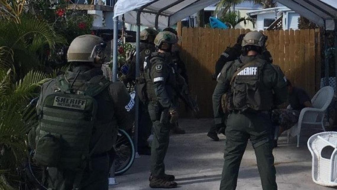 Law enforcement surrounds a Big Pine Key home where Duviel Gonzalez was found Feb. 17.