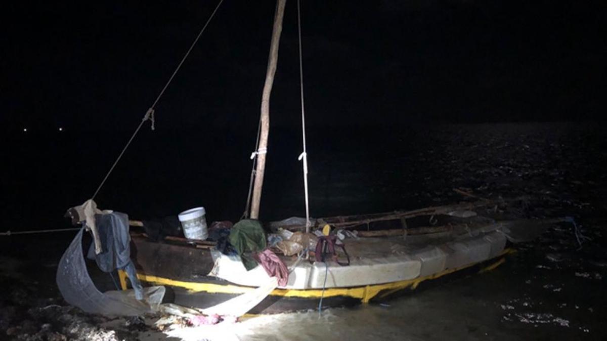 A makeshift vessel rests on a Lower Matecumbe Key beach Tuesday morning, April 3, 2018. Twelve Cuban nationals arrived on the boat, the first such landing in the Keys since December.
