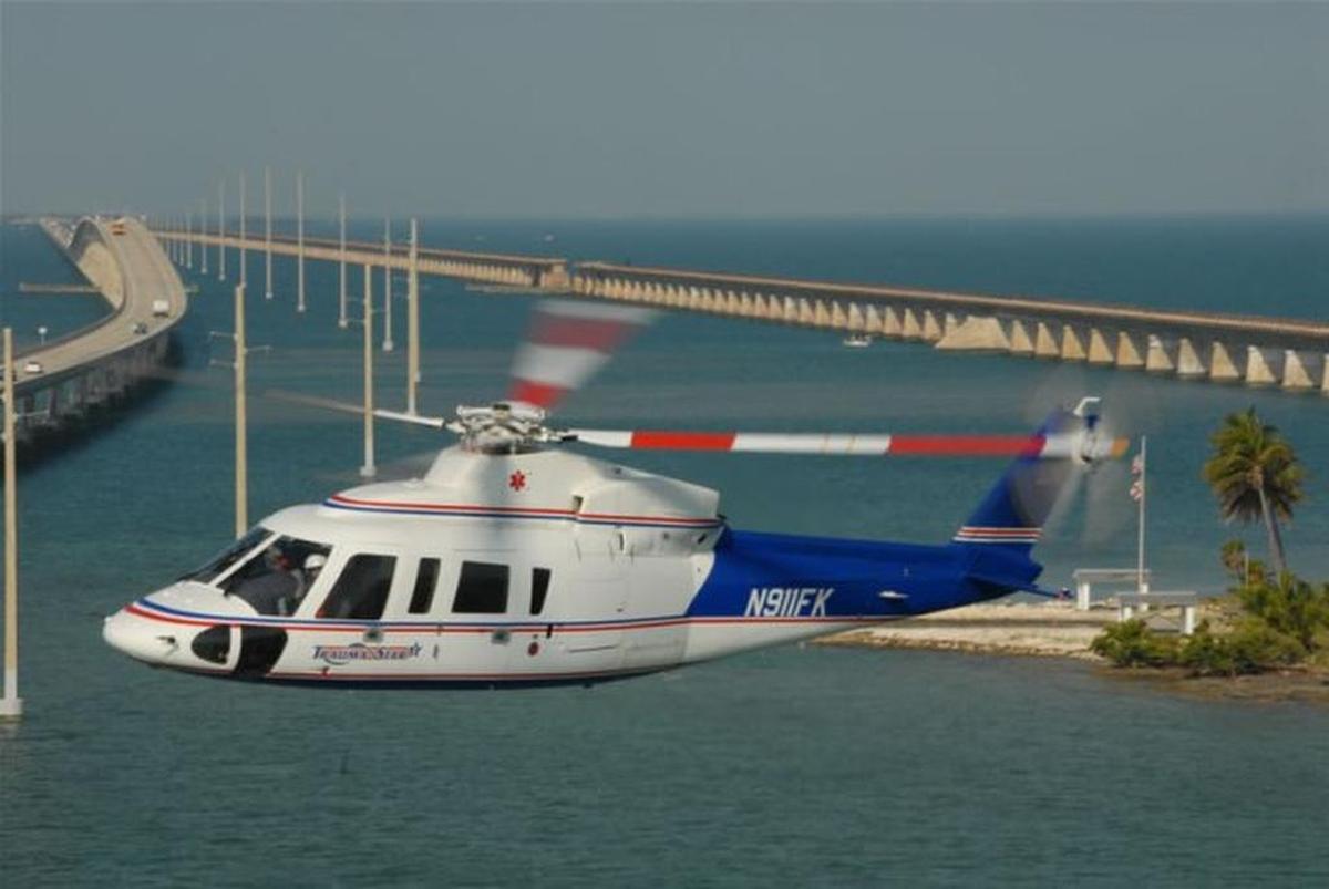 Monroe County’s Trauma Star Sikorski S76 helicopter ambulance flies near the Seven Mile Bridge in the Middle Keys in this undated photo.