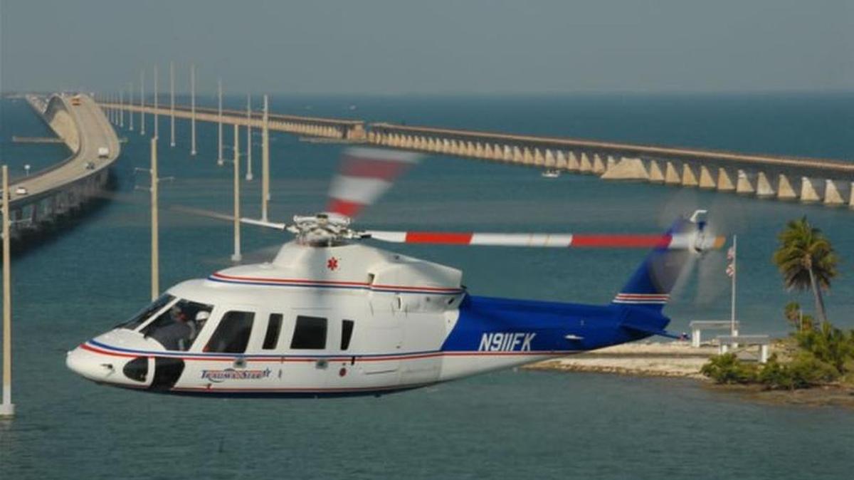 Monroe County’s Trauma Star Sikorski S76 helicopter ambulance flies near the Seven Mile Bridge in the Middle Keys in this undated photo. 