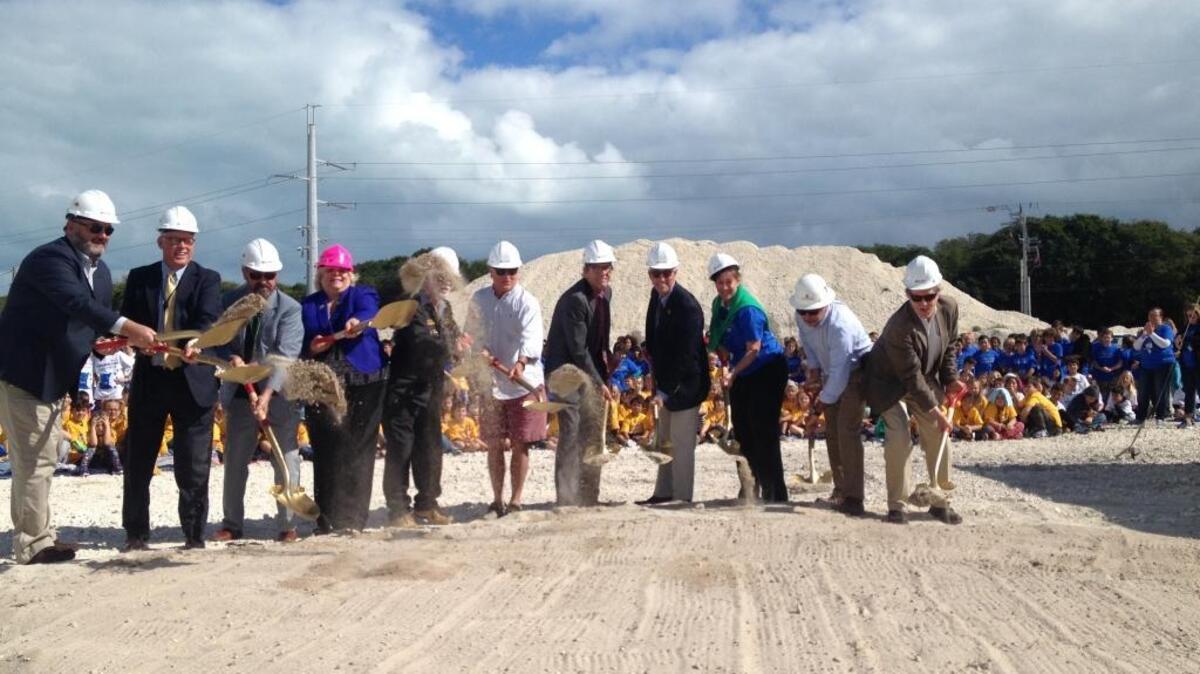 Monroe County School Board members, Plantation Key School Principal Lisa Taylor, Islamorada Village Council members and architects ceremonially break ground on the new Plantation Key School on Tuesday, Jan. 10.