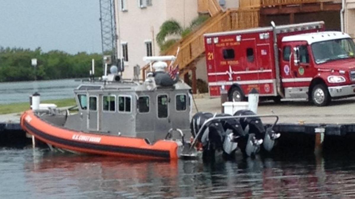 A U.S. Coast Guard response boat brough Islamorada Fire-Rescue medics to Davis Reef Monday morning to treat an unresponsive scuba diver.