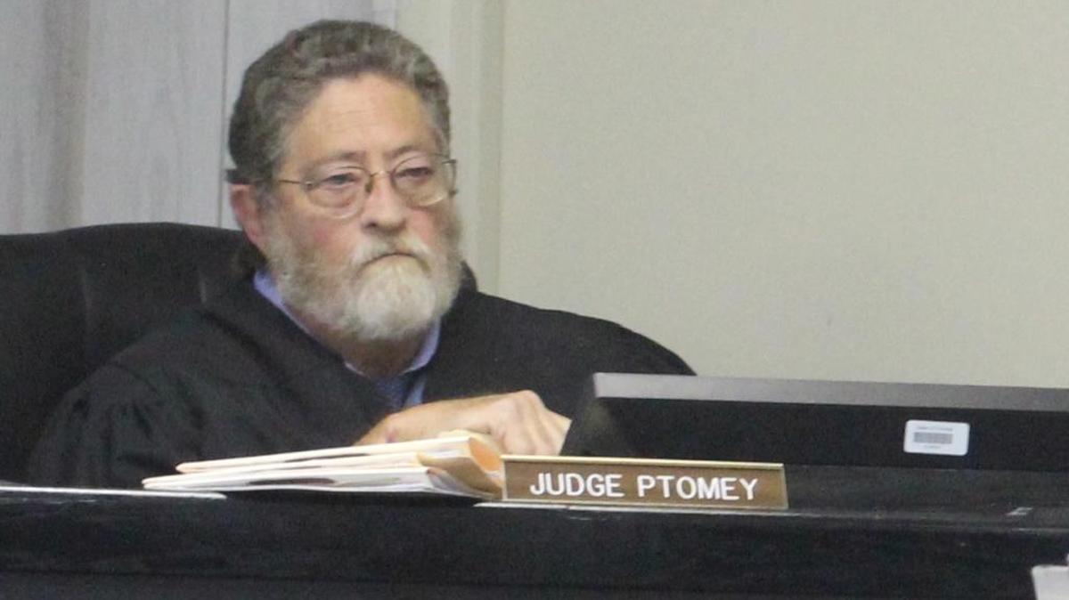 W. Regan Ptomey presides over Monroe County Court before his recent retirement. Ptomey served 30 years on the bench and supports keeping the job as an elected office.