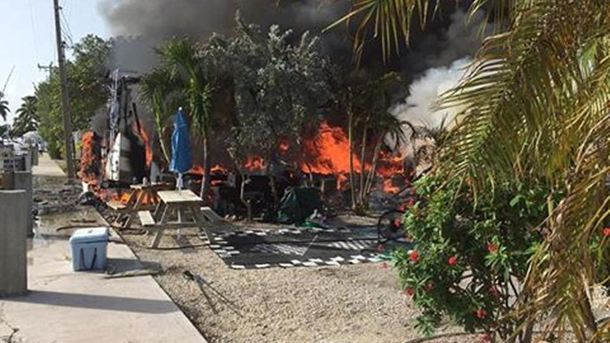 Flames engulf an RV Saturday afternoon, June 18, at the Sunshine Key campground at mile marker 40.