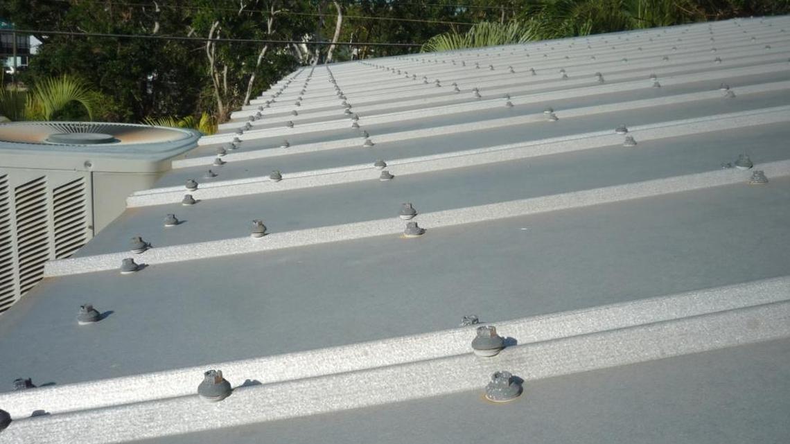 Metal roofing adds more protection to Florida Keys homes, but may not be practical in many situations, roofing professionals told county commissioners. A proposed metal-roof ordinance has been moved back to a Dec. 13 meeting.
