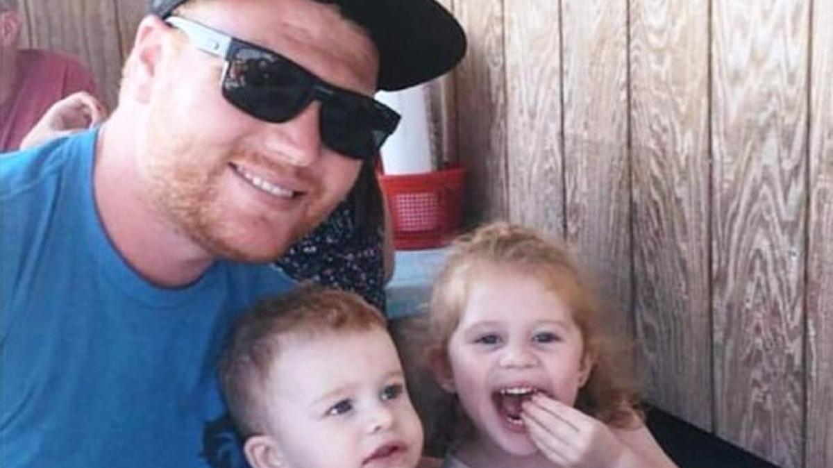 David Corlew, shown with his children in a GoFundMe photo, is recovering after being seriously injured when struck by a boat off Key West on Saturday.