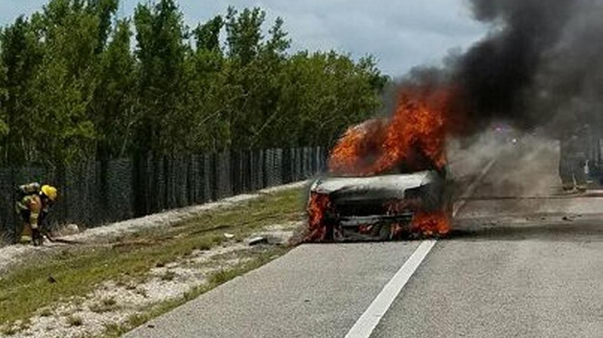Flames engulf a van on the side of U.S. 1 at mile marker 115 Wednesday afternoon, April 26.