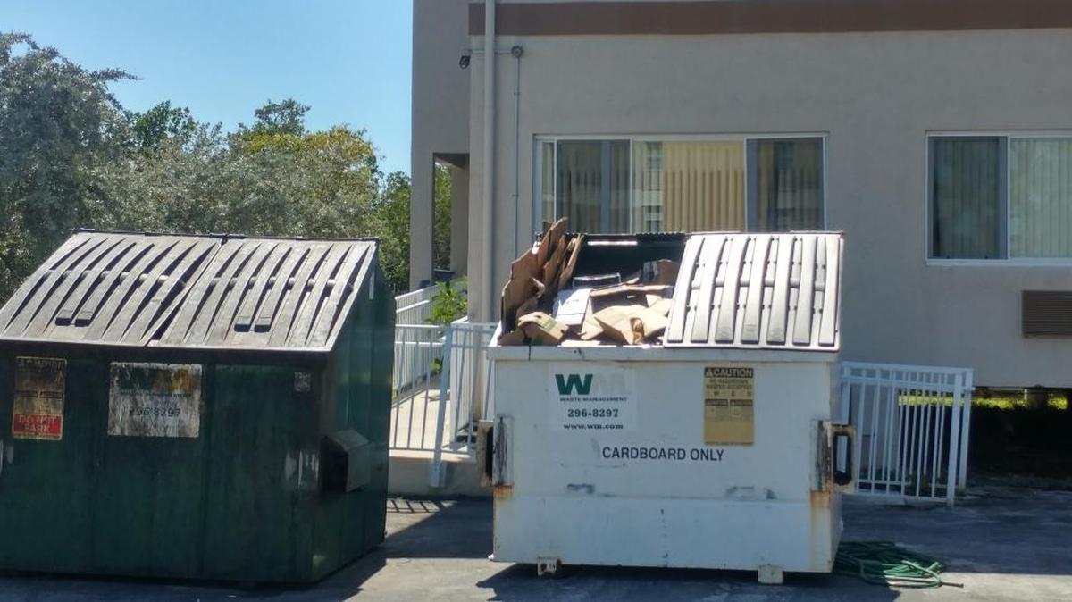 Dumpsters behind Key West Health and Rehabilitation on Stock Island. Police wouldn’t specify in which container the body was found.