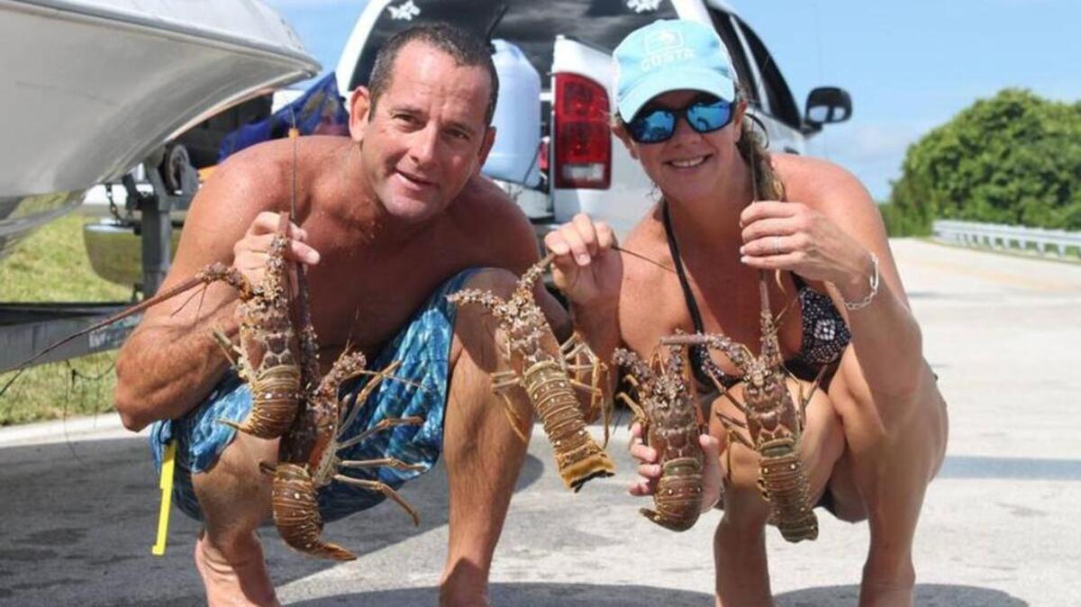 Lucky lobster divers show their catch during a past mini-season at Veterans Park on Little Duck Key.