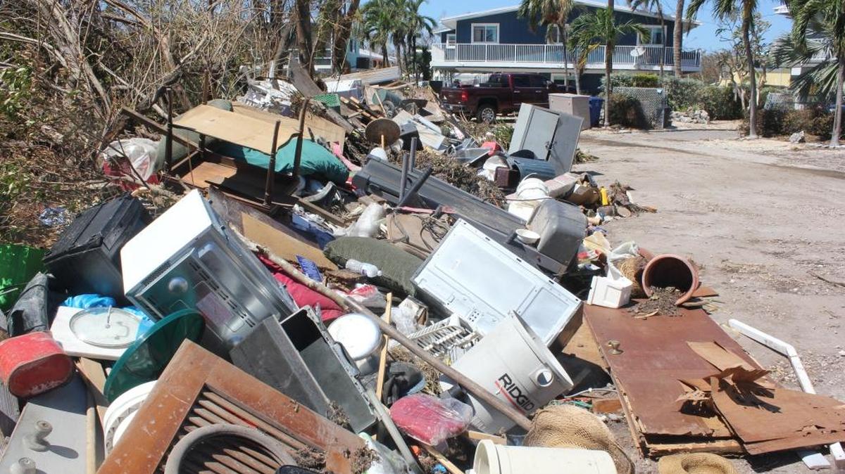 This is a common site throughout the Keys. It will take time but the debris will be gone. Use it as a measure of our progress.