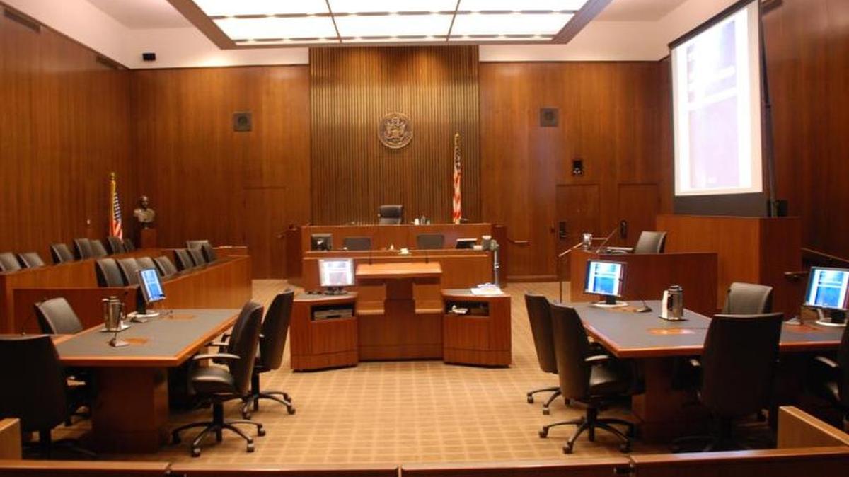 The former schools finance chief says she was forced to retire.