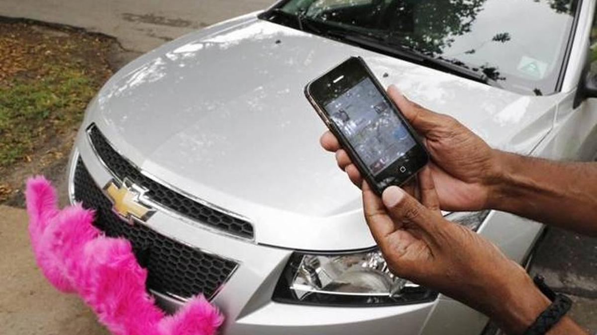A Lyft car operates in Miami-Dade County.