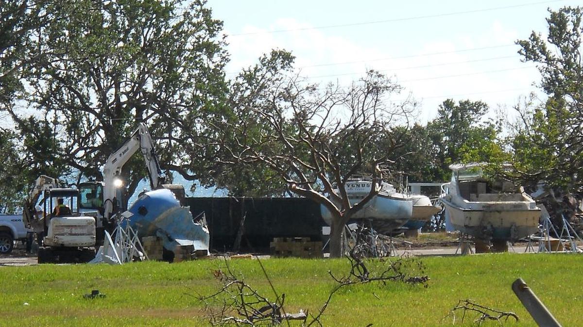 Boats are crushed in the open air at Harry Harris Park.