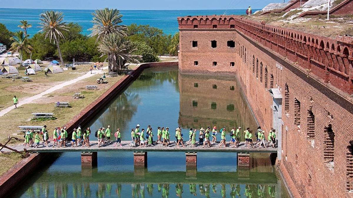 Descendants of Dr. Samuel A. Mudd walk into Fort Jefferson in Dry Tortugas National Park in 2015 to mark the 150th anniversary of Mudd’s arrival at the isolated Gulf of Mexico fort where he was imprisoned after splinting the broken leg of President Lincoln’s assassin. The former Union military prison lies 68 miles west of Key West. After serving four years in the prison, Mudd was pardoned.