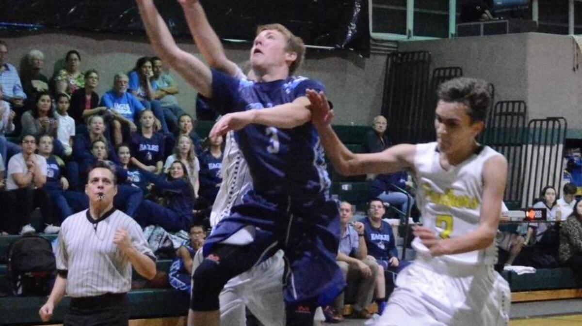 Island Christian’s Adam Dudley breaks away for a bucket in the Eagles’ win at Princeton Christian.