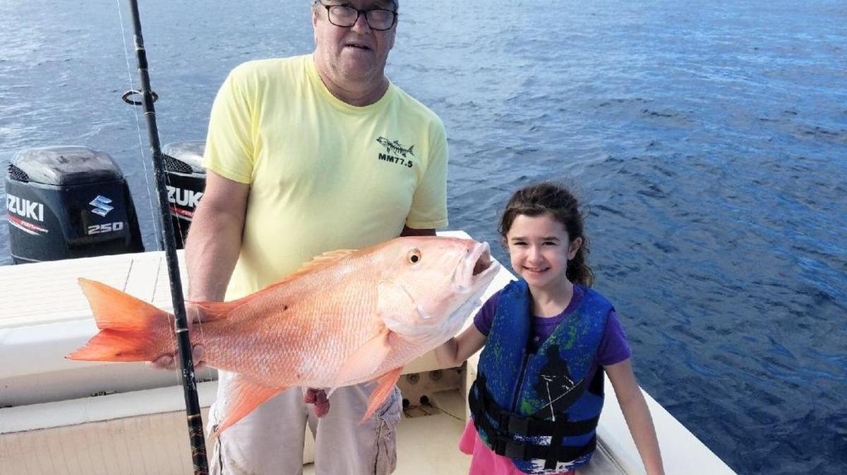 Rob Innella from New Jersey got some assistance from his daughter Samantha with this hefty mutton snapper he caught with Capt. Jason Bell and SeaSquared Charters.